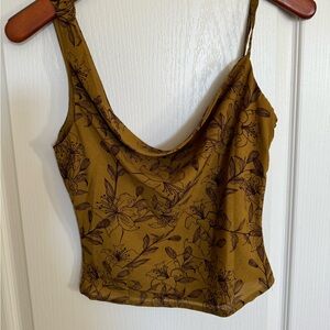 Beautiful asymmetrical draped neckline sleeveless chiffon floral top from Lulus